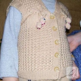 süslemeli bebek yeleği