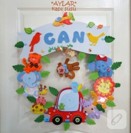 Can bebeğe kapı süsü
