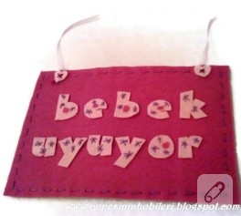 Bebek uyuyor kapı süsü