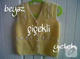 Beyaz çiçekli örgü yelek