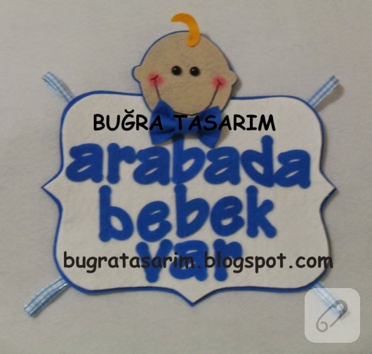 Keçeden arabada bebek var tabelası